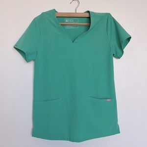 Figs surgical green cargo pants with blue tie and Two pocket scrub top